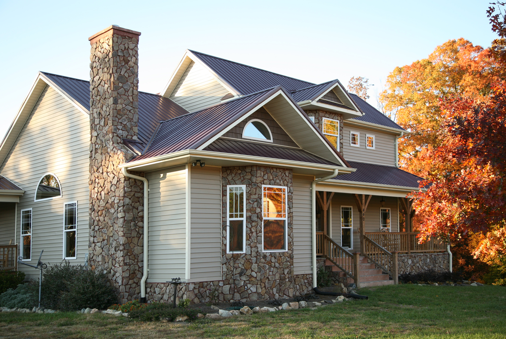 Beige and Stone House in the Fall Fall Chimney Cleaning Albuquerque